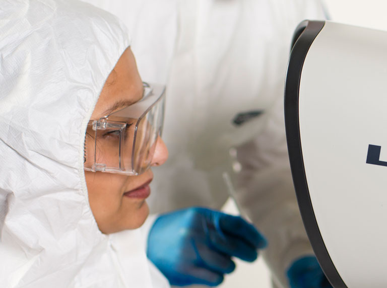 02-Lynx-EVO-microscope-user-with-full-PPE